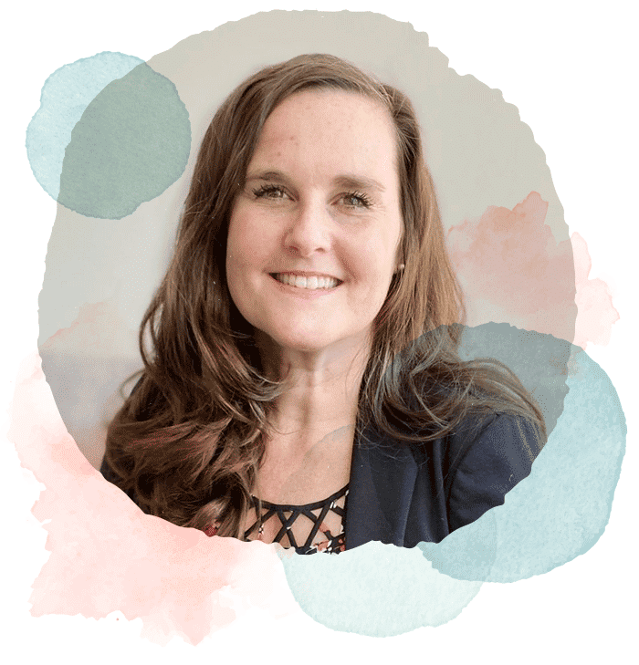 An image of Jennifer smiling surrounded by watercolour shapes. Premarital counselling in vancouver bc