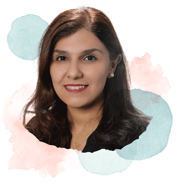 An image of Saba smiling surrounded by watercolour shapes. Premarital counselling in vancouver bc
