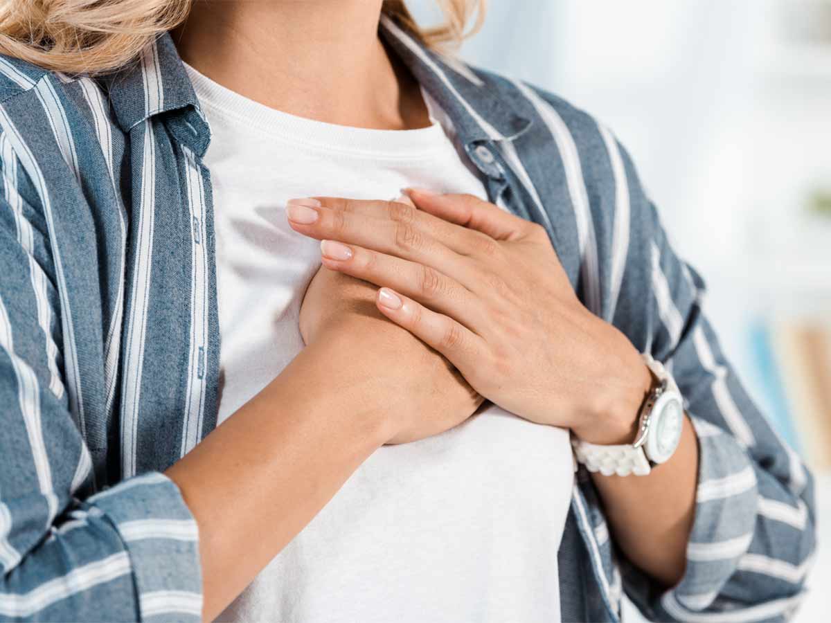 Illuminate Counselling North Vancouver, BC woman with hands folded on her chest